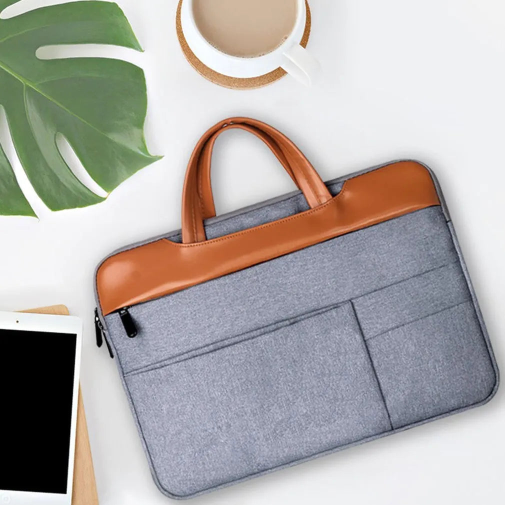 Grey official document liner laptop bag with nylon exterior and zipper closure for 15-inch devices