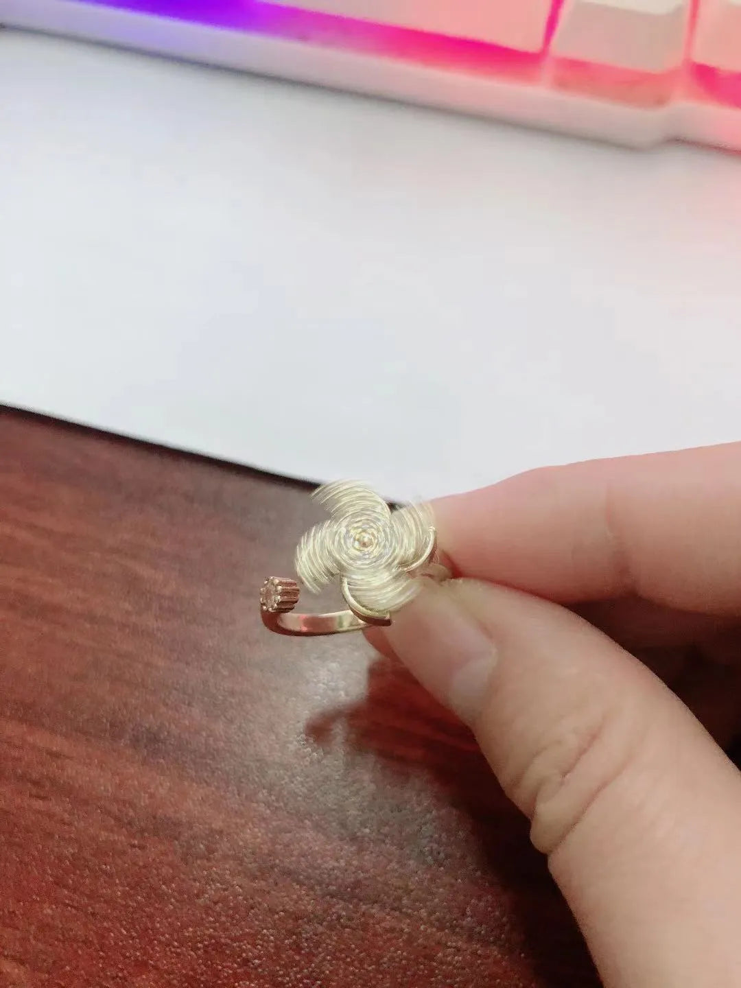 Micro inlaid rotating ring in copper with gold or silver electroplated finish