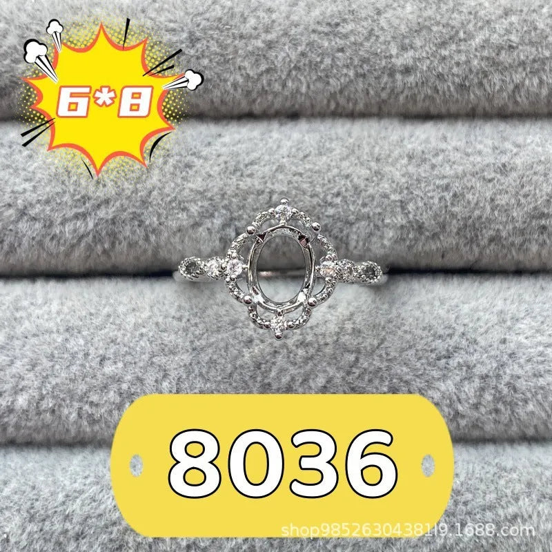 Oval denier ring ornament with 6x8mm stone, open mouth design, and five-pointed star detail
