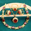 18k gold plated jewellery set with cubic zirconia stones showing necklace, earrings, ring and bracelet