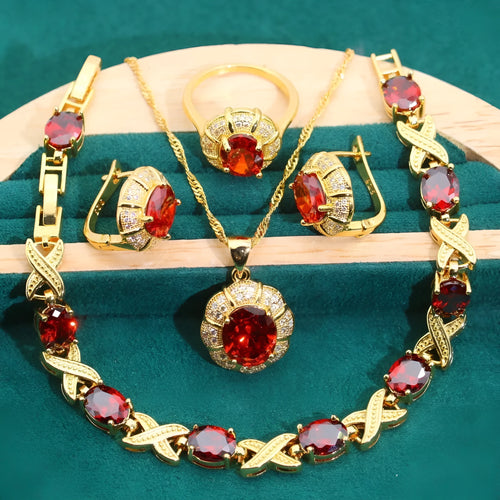 18k gold plated jewellery set with cubic zirconia stones showing necklace, earrings, ring and bracelet