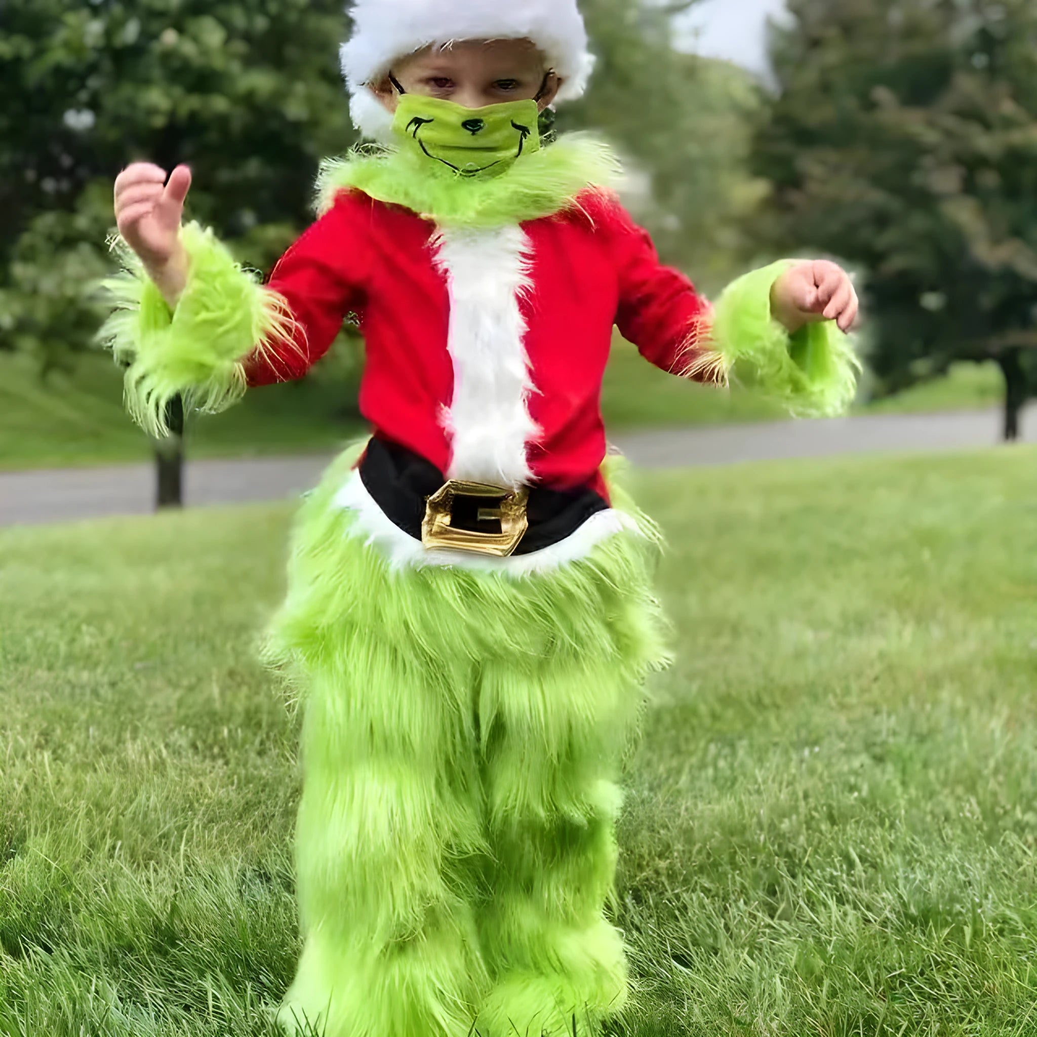 Children's green cotton Halloween costume set with top and pants on display