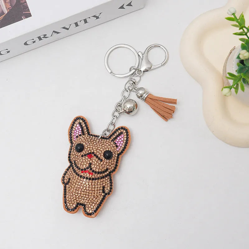 Colourful cartoon animal rhinestone keychain on a metal ring.