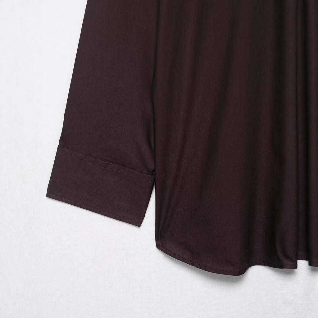 Brown women's poplin shirt with long sleeves, a bow tie, and a loose cardigan fit.