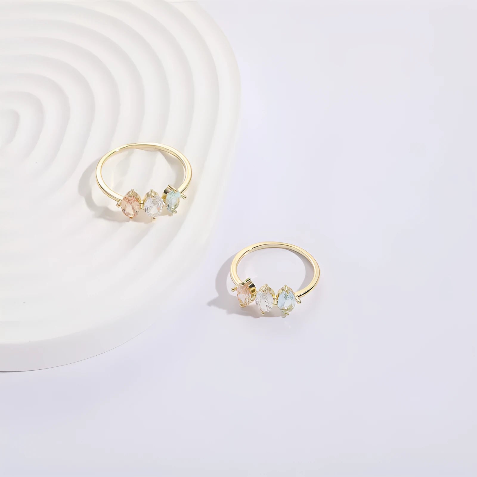 Geometric triangle ring with horse eye tricolor zircon in electroplated 14k gold colour on copper