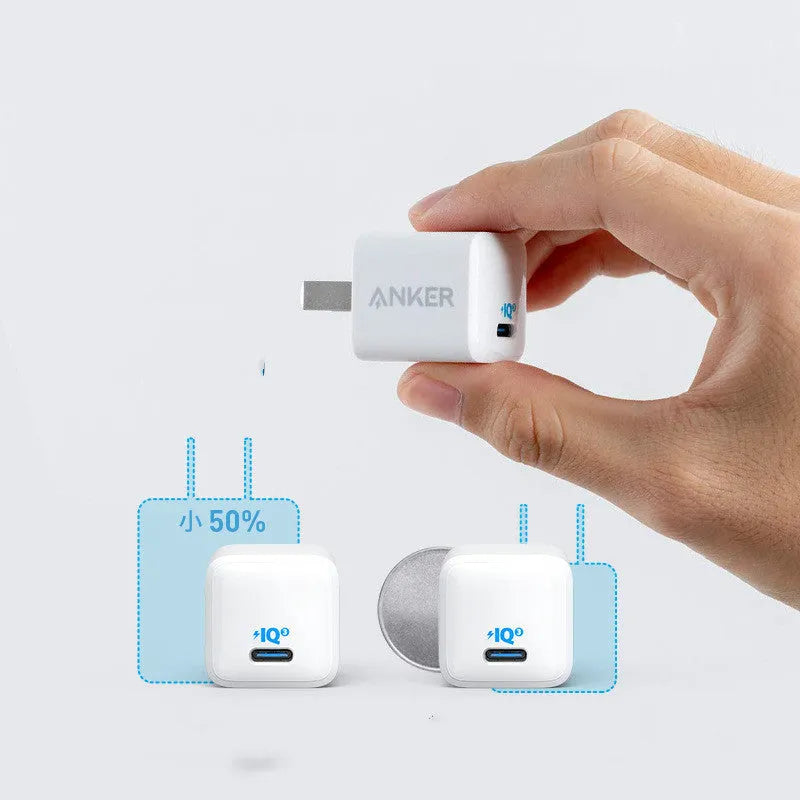 White 18W travel USB charger for mobile phones with fast charging capability
