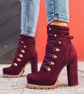 Women's suede Roman boots with thick high heel above 8cm in army green colour with rivet and buckle details