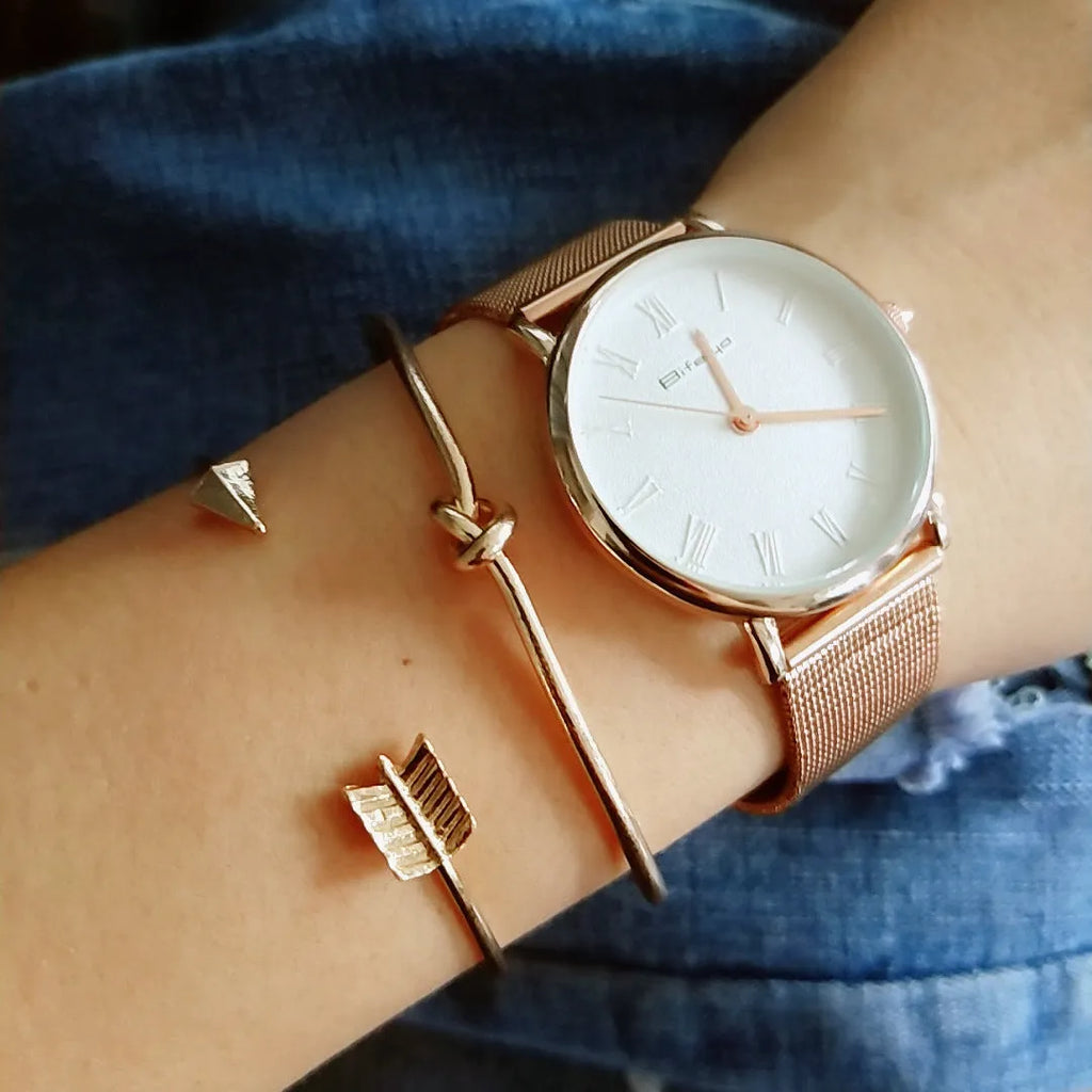 Women's gold vintage cuff bracelet with knotted arrow design in alloy with electroplated finish