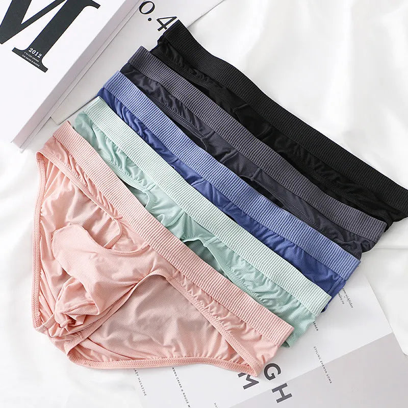 Men's low waist ice silk briefs in multiple colours on a size chart background.