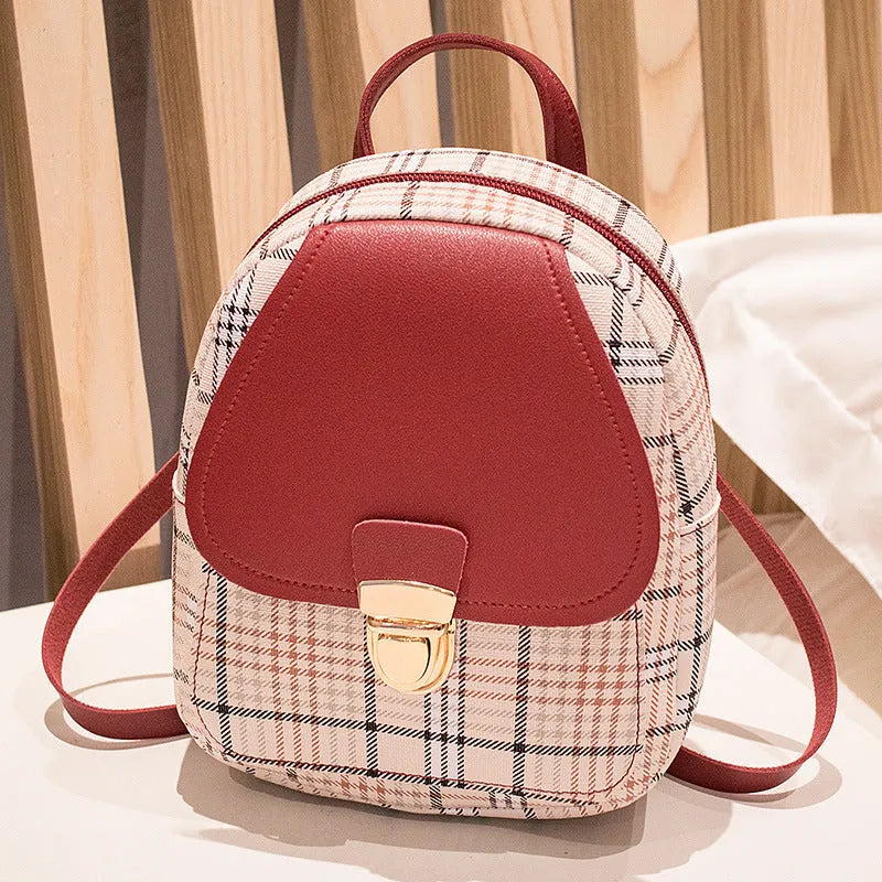 Diagonal one shoulder phone bag in PU fabric available in black, blue, brown, pink, and red colours.