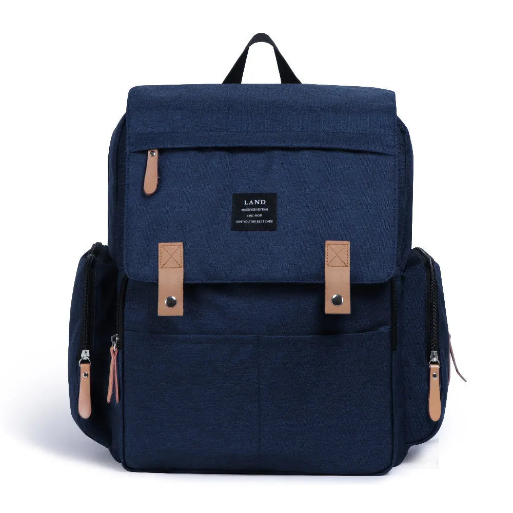 LAND Mommy large oxford cloth diaper backpack with changing mat, shown in grey colour.