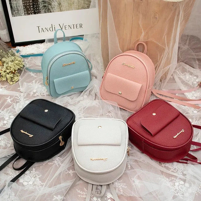Women small solid colour PU backpack with zip closure for mobile phone and student travel use