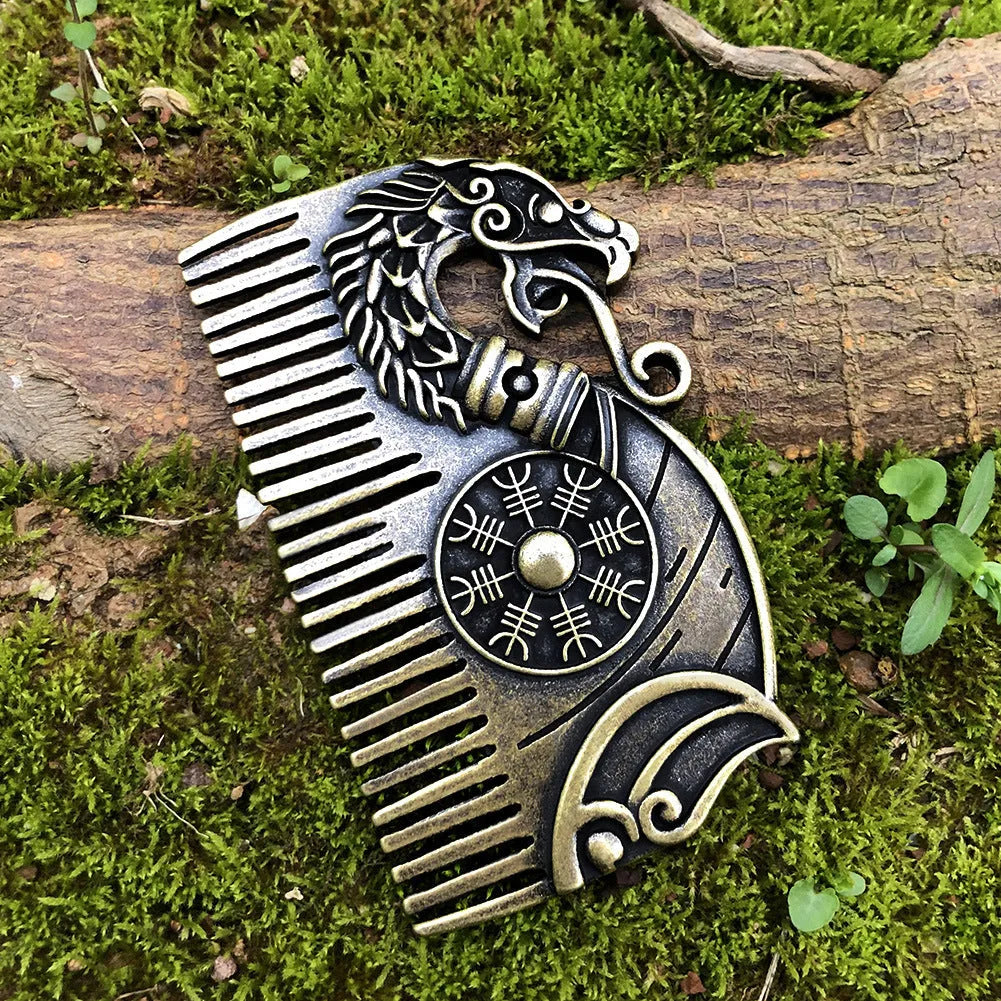 Bronze double-sided Viking rune comb with dragon motif on neutral background