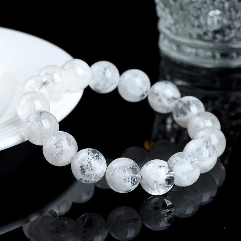 Crystal women's bracelet with natural blizzard snowflake round beads in geometric design featuring Ruyi and Xiangyun elements