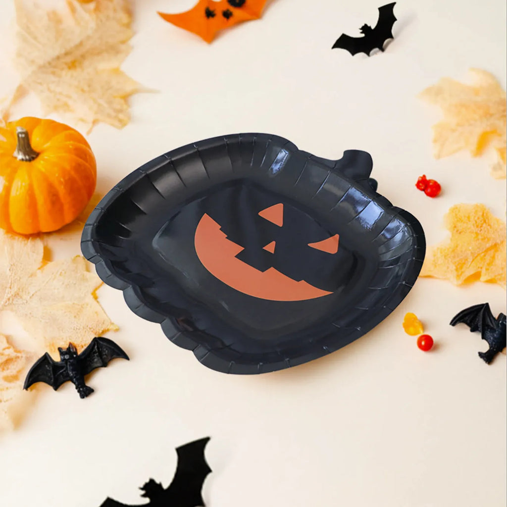 Halloween disposable paper plates with black pumpkin design, 9-inch diameter