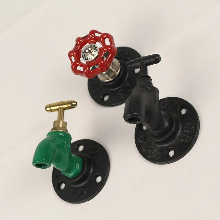 Metal wall-mounted water pipe style towel rack hook in black, green, or red polished finish.