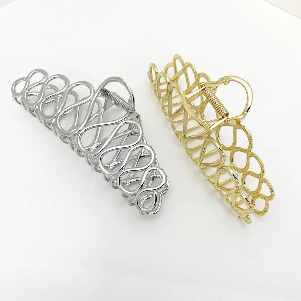 Gold and silver alloy hair clip with tassel detail for updo hairstyles