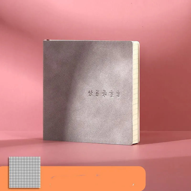 A5 square notebook with textured mesh leather cover in avocado green, showing blank internal Daolin paper.