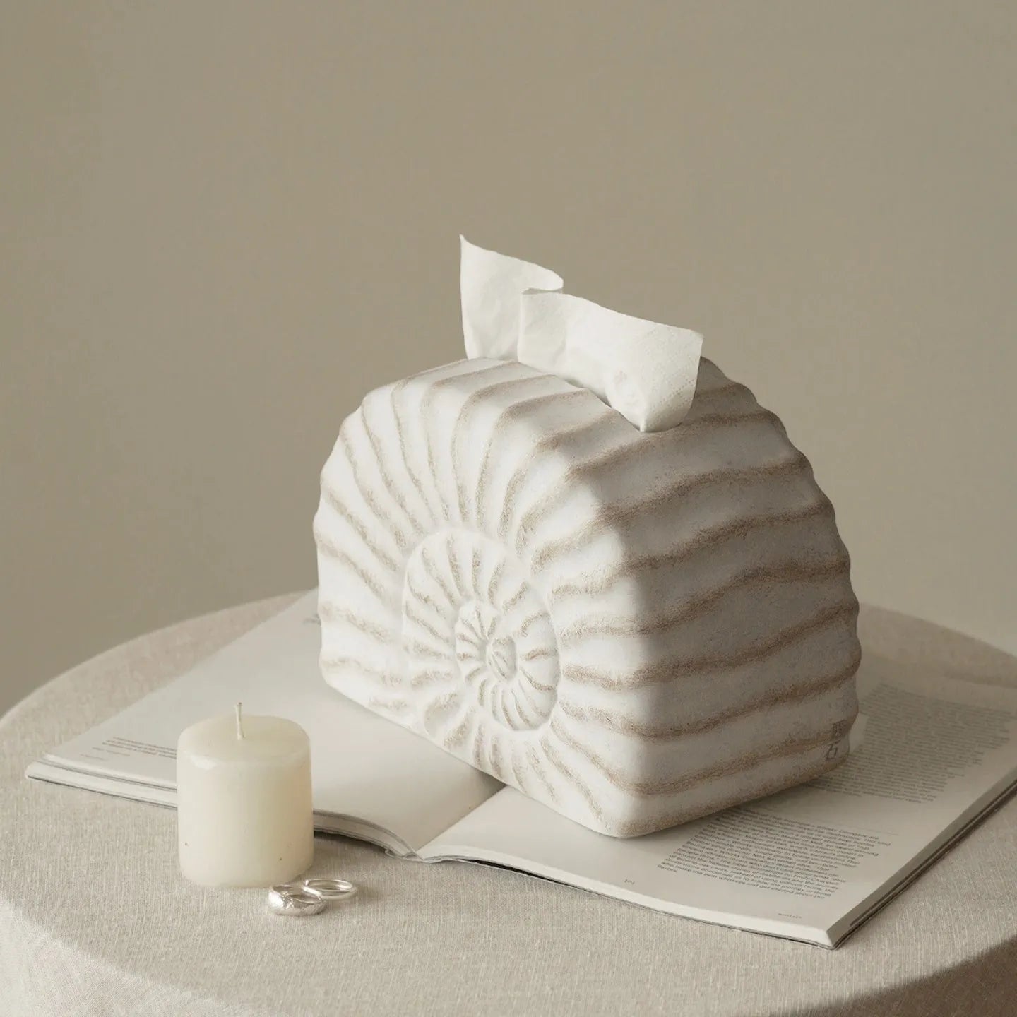 Conch coloured resin tissue box with modern minimalist design for home decor