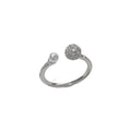 Open-end pearl ring with round zircon in gold plating on geometric copper band