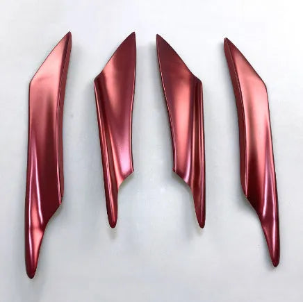 Set of four ABS plastic bumper blades for car styling in carbon fibre finish