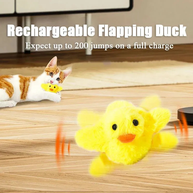 Yellow chick-shaped electric interactive cat toy with plush cover on a plain background.