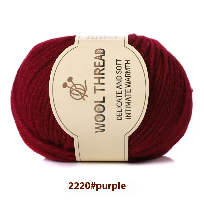 Roll of domestic wool knitting yarn for 10 needles in various colours including green, red, and blue
