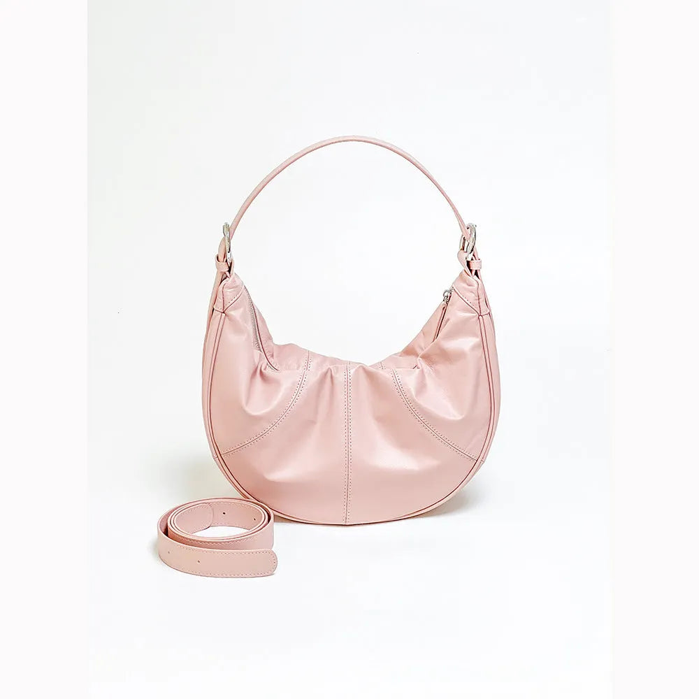 Women's soft cowhide leather shoulder bag with dumpling shape showing sandwich pocket and double joint straps