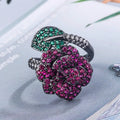 Gold-plated black gold ring with geometric shape and floral design featuring simulation red corundum elements