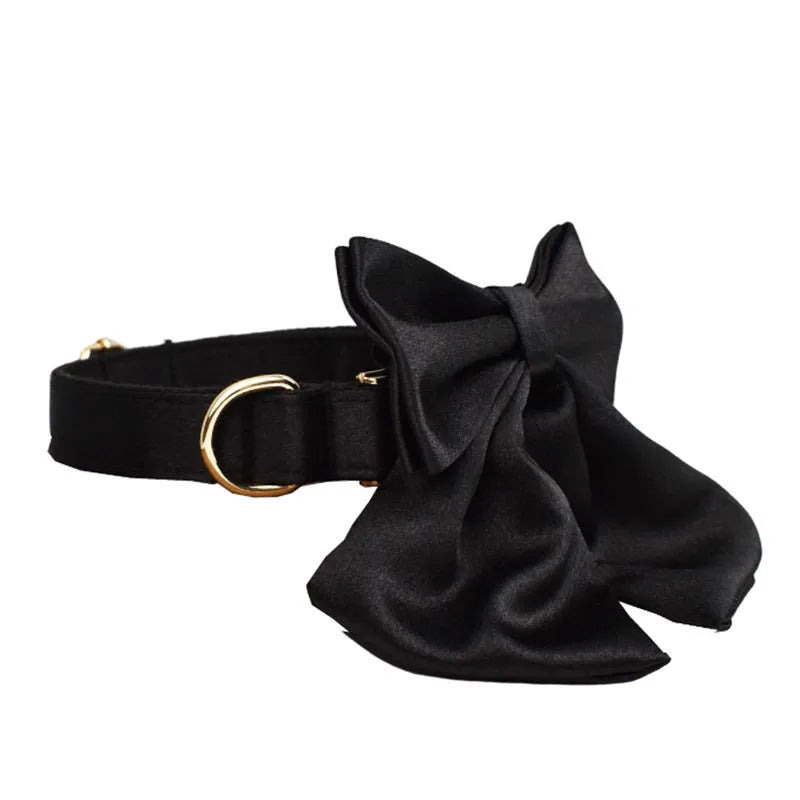 Cloth dog collar and leash set with matching harness vest and decorative bow in assorted colours.