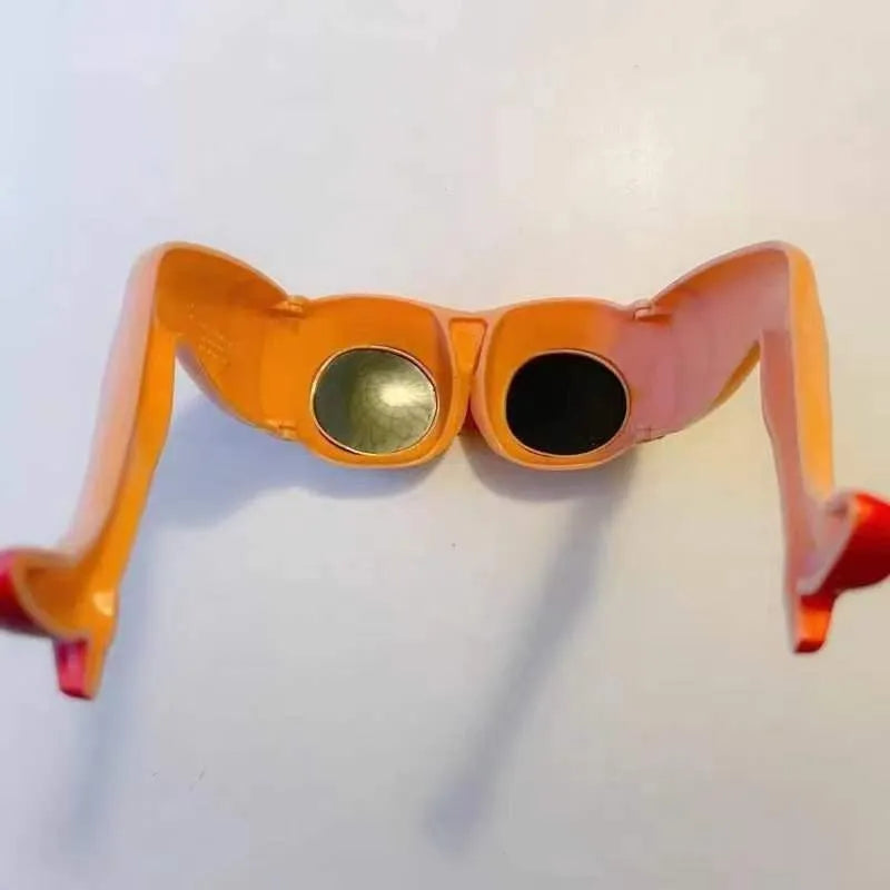 Orange plastic novelty sunglasses with leg hip design and oversize frame dimensions