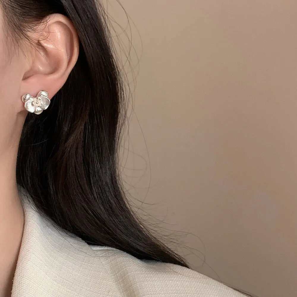 Retro flower fashion earrings for women with petal design in gold or silver electroplated finish