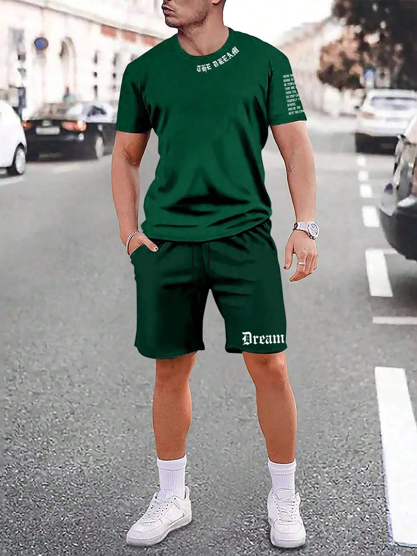 Sports style short-sleeved top and matching shorts set laid flat, showing thin polyester blend fabric.