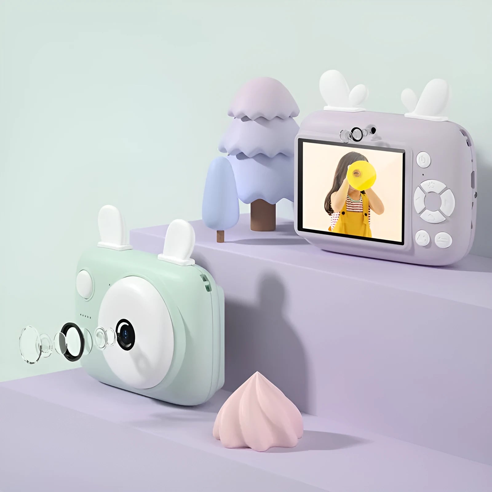 Macaron-themed A2 kids digital camera with lanyard, shown in green colour with 2.4-inch screen.