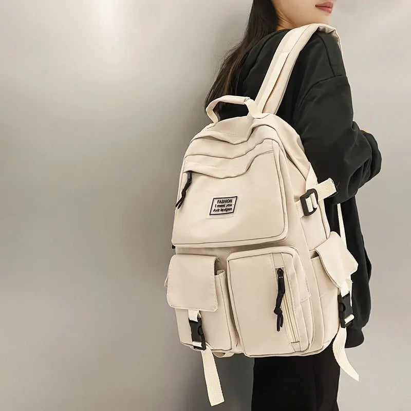 Black nylon student backpack with laptop compartment and front pocket