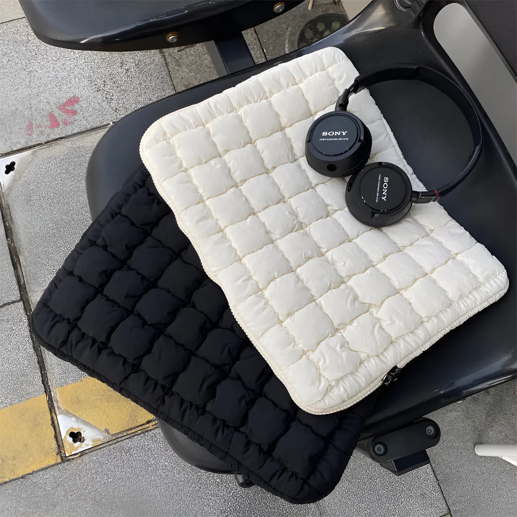 Black nylon laptop shoulder bag showing large capacity and shoulder strap