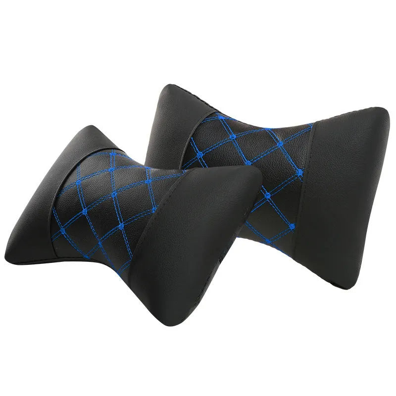 Black quilted car headrest neck pillow with diamond pattern and contrasting stitching