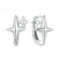 Minimalist sterling silver star-shaped clip-on earrings featuring a XINGX pattern and oxidised finish.