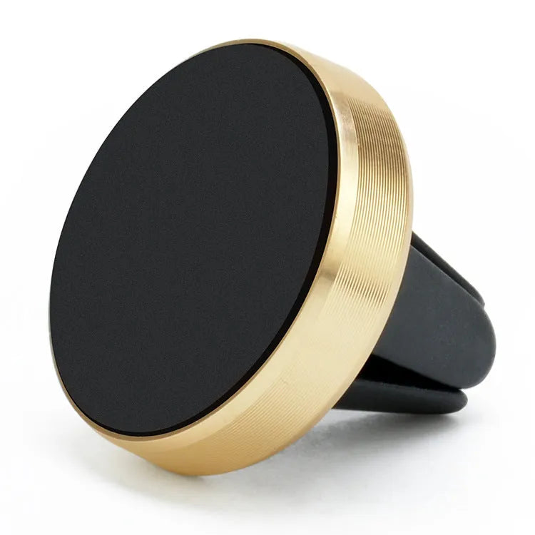 Magnetic car phone holder attached to a vehicle air vent, showing phone mounted and 360-degree rotation.