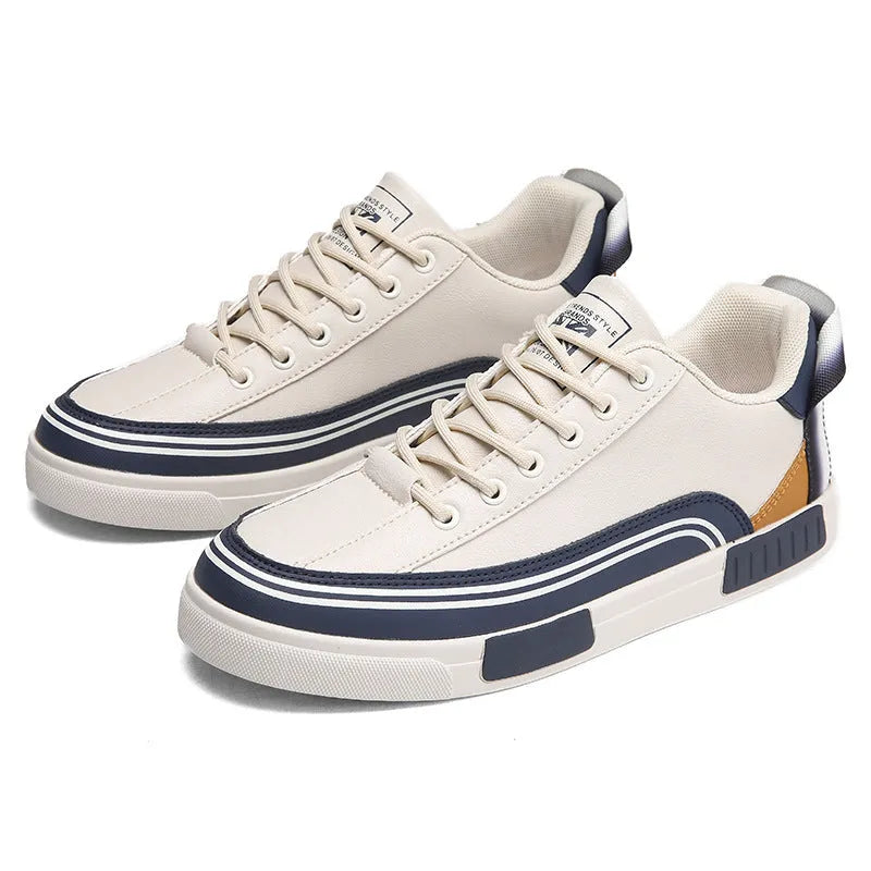 Men's white and green canvas casual shoes with mesh ventilation panels on the upper.