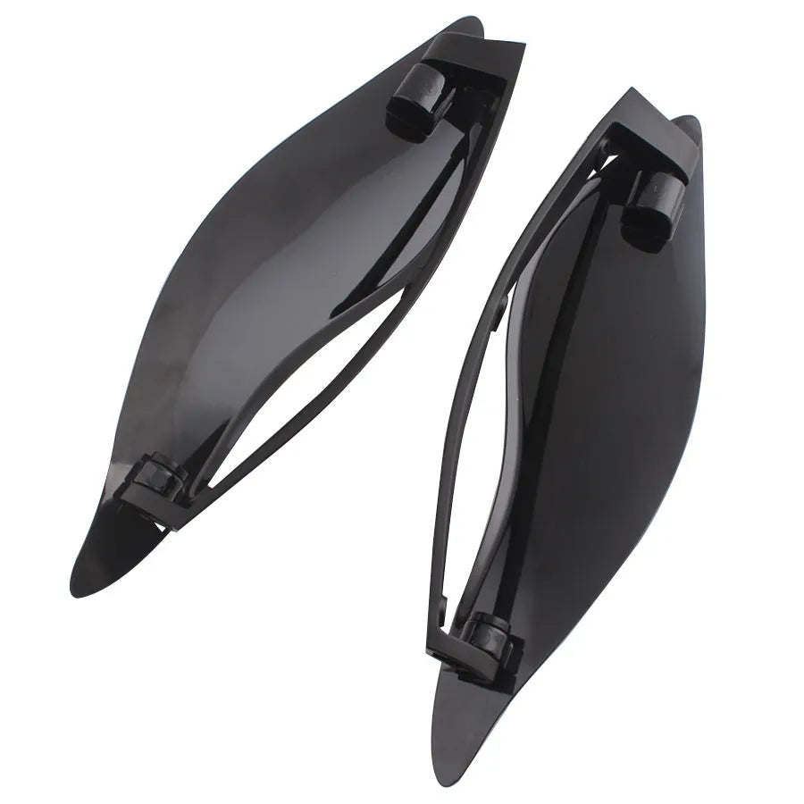 Pair of smoked ABS plastic windshield side wings for a Harley three-wheel glide motorcycle.