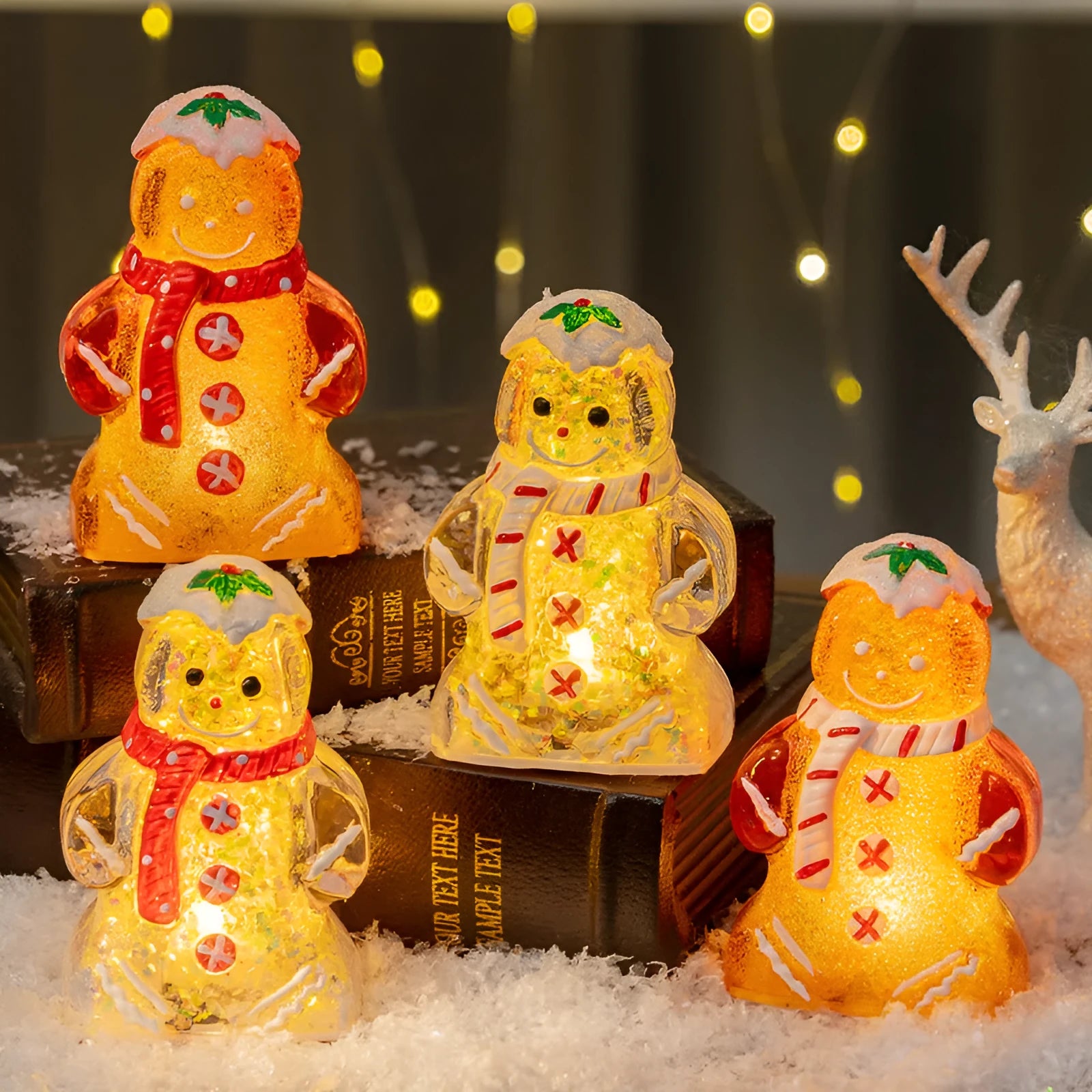 Glowing red-scarf gingerbread man Christmas ornament with modern design on a green tree branch.