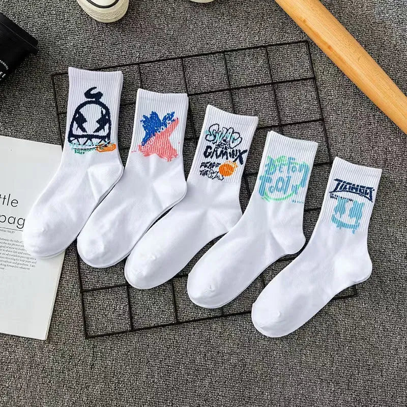 10 pairs of white cotton tube socks with graffiti pattern, middle calf length, on a plain background