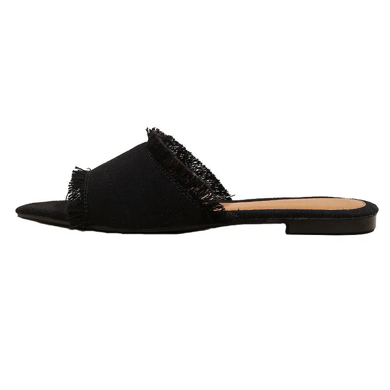 Women's denim flat slippers with tassel detail and leather lining in multiple colour options