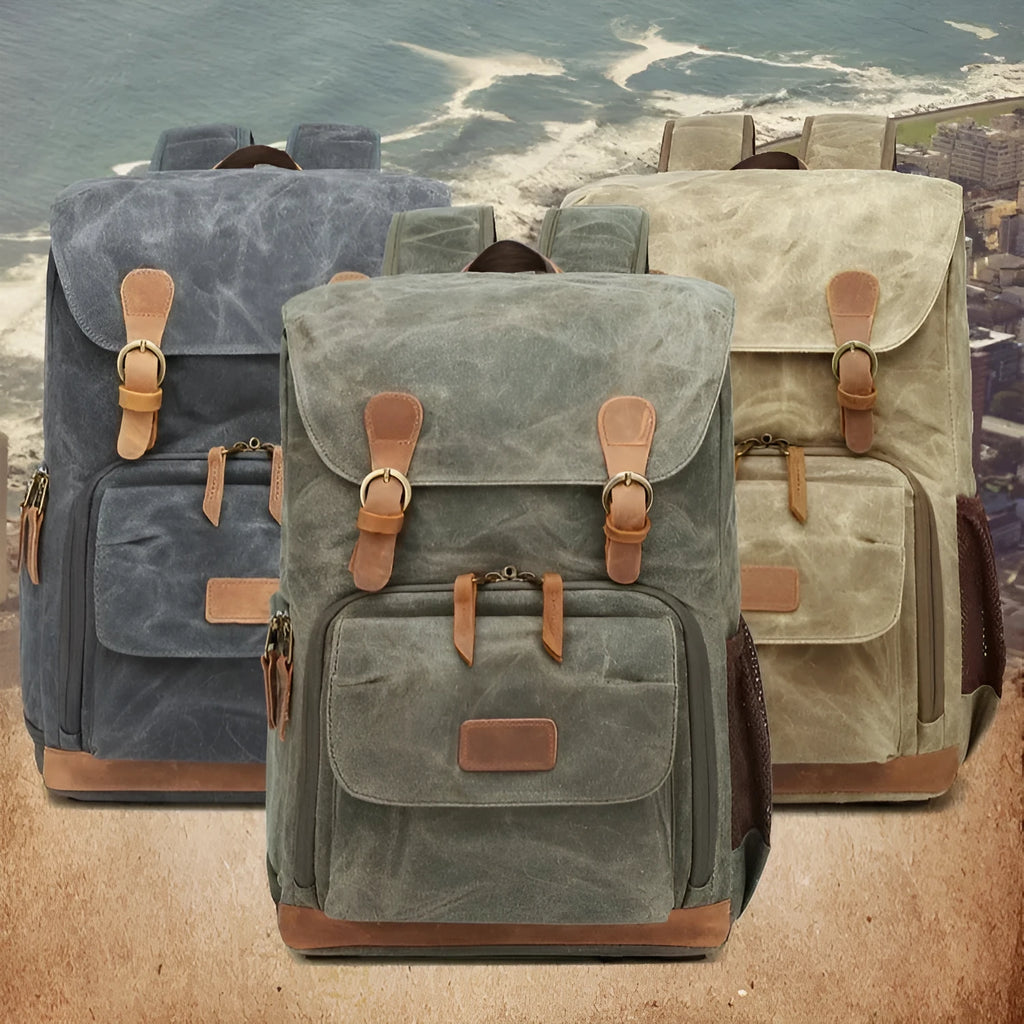 Grey black canvas backpack style DSLR camera bag with straps and zips