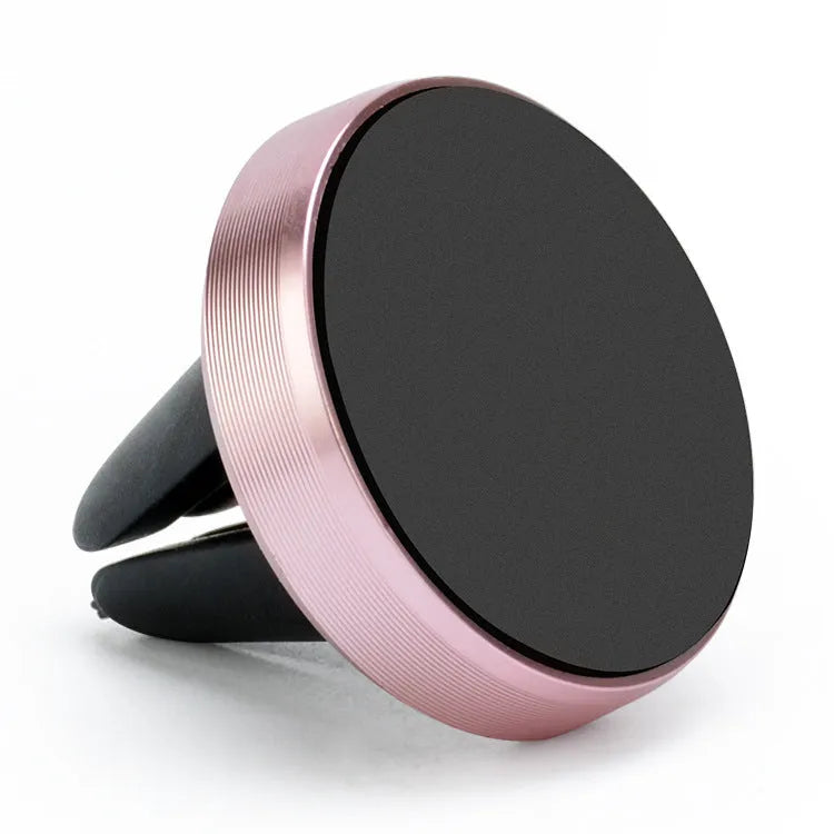 Magnetic car phone holder attached to a vehicle air vent, showing phone mounted and 360-degree rotation.