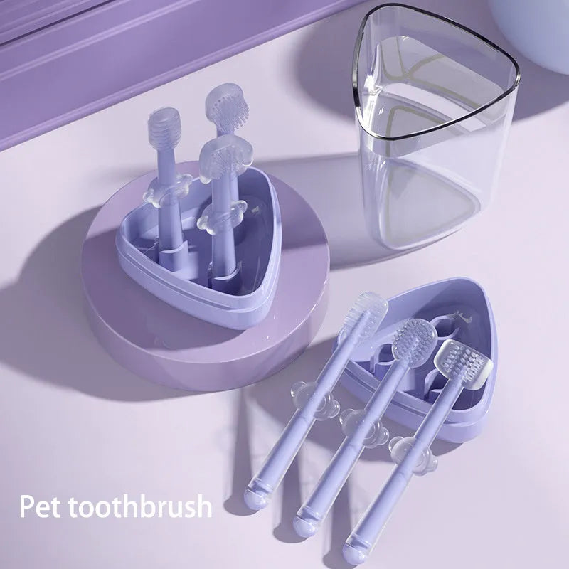 Silicone pet toothbrush for cats and dogs in blue, green, and purple colours for dental care.