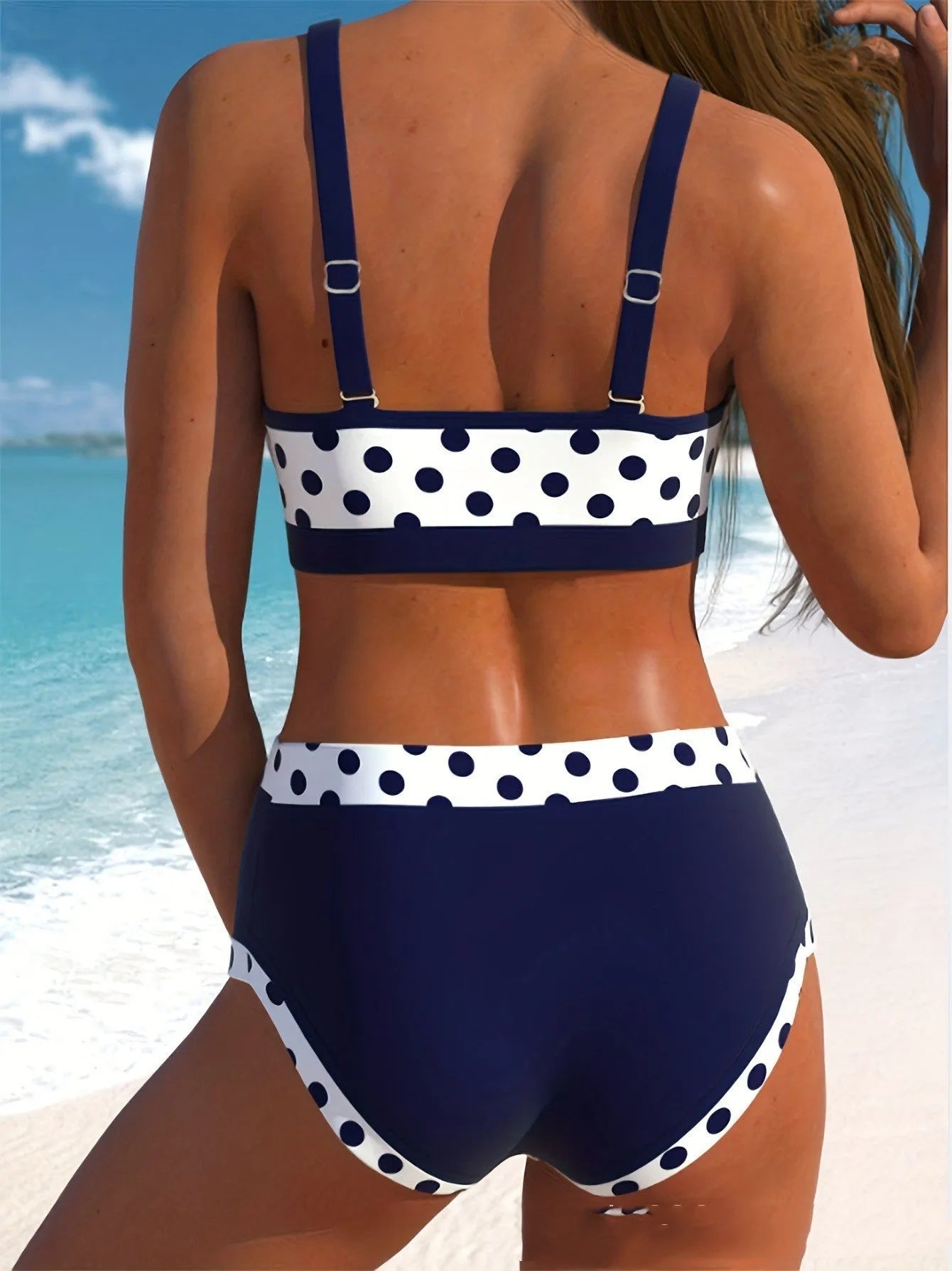 Women's multicolour wave print polyester bikini swimsuit with briefs bottom.