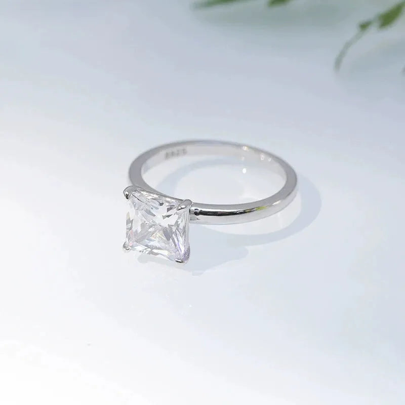 Simple geometric round 925 sterling silver women's ring in gold, rose gold, and silver colour options.