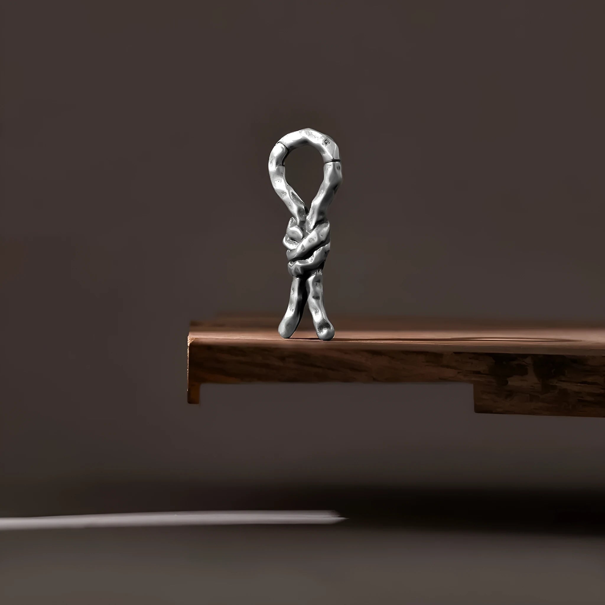 Creative Bends And Hitches 4mm copper auricle earrings with a bent, retro design.